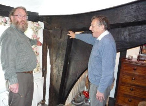 Member Tony Singleton shows owner Philip Cox key features of a Wealden house